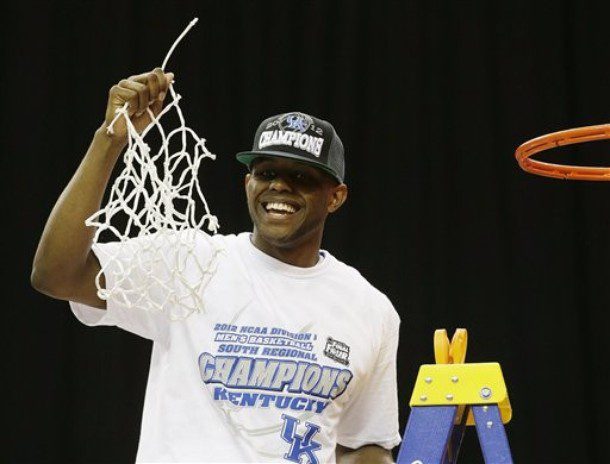 Kentucky's Darius Miller holds the net after cutting it down after an NCAA tournament South Regional finals college basketball game against Baylor Sunday, March 25, 2012, in Atlanta. Kentucky won 82-70. (AP Photo/David J. Phillip)