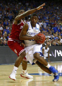Kentucky Wildcats guard Doron Lamb (R) drives around Indiana Hoosiers guard Remy Abell during the second half of their men's NCAA South Regional basketball game in Atlanta, Georgia, March 23, 2012. REUTERS/Chris Keane (UNITED STATES - Tags: SPORT BASKETBALL)
