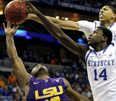 LSU Tigers guard Stringer has the ball blocked by Kentucky Wildcats forward Kidd-Gilchrist during the second round of the SEC men's NCAA basketball tournament in New Orleans - photo by Jonathan Bachman | Reuters