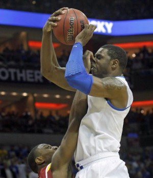 University of Kentucky's Jones fights for rebound during NCAA game in Louisville - photo by John Sommers II | Reuters