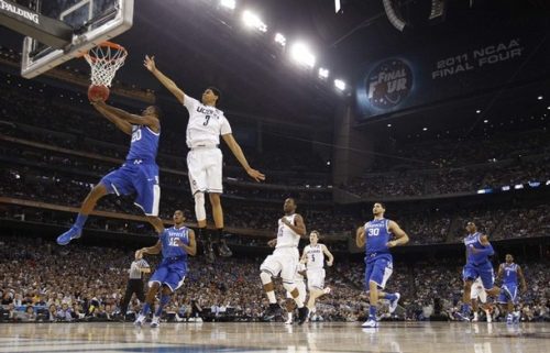 Kentucky Wildcats' Lamb goes to the basket past Connecticut Huskies' Lamb during their NCAA Final Four college basketball game in Houston